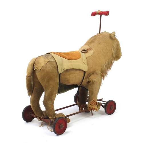 2425 - Antique Steiff stuffed ride on lion with growler, 54cm in length