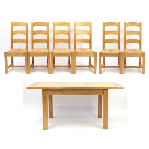 2028 - Contemporary light oak extending dining table with extra leaf and six chairs, the table 78cm H x 120... 