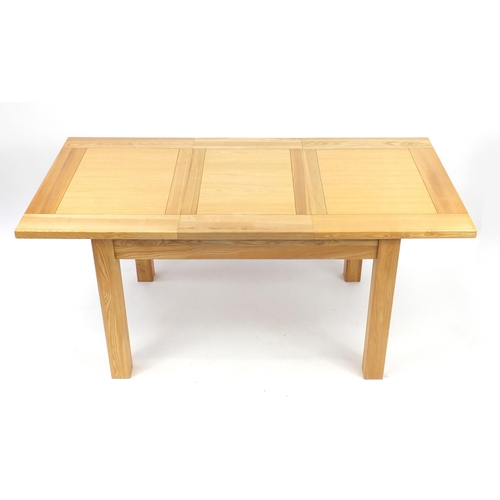 2028 - Contemporary light oak extending dining table with extra leaf and six chairs, the table 78cm H x 120... 