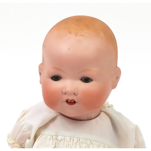 2427 - German Armand Marseille bisque head doll numbered 351/8k and one other , the largest 45cm high