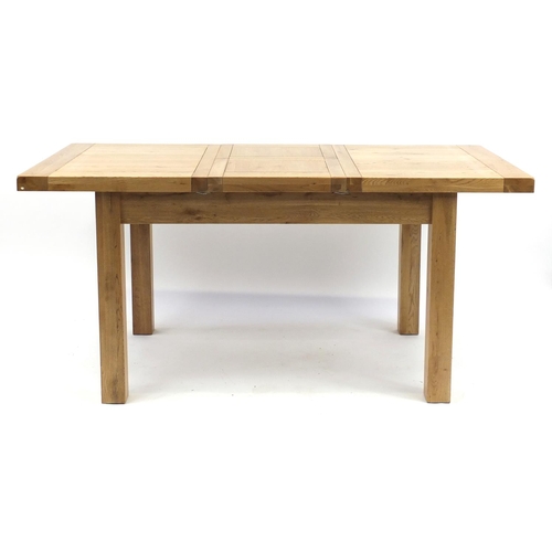 2002 - Contemporary light oak extending dining table, with folding leaf and four chairs, 79cm H x 167cm W (... 