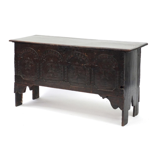 2031 - Oak plank chest with Arcadian and Fleur de Lis carved panel front, 65cm H x 121cm W x 43cm D