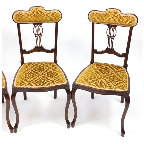 2039 - Set of four Edwardian mahogany salon chairs with gold floral upholstery
