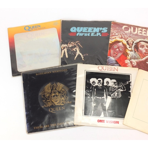 2626 - Seven Queen 45RPM's including The Miracle with hologram sleeve