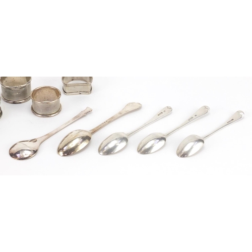 2547 - Seven silver napkin rings and five spoons, various hallmarks, approximate weight 230.0g