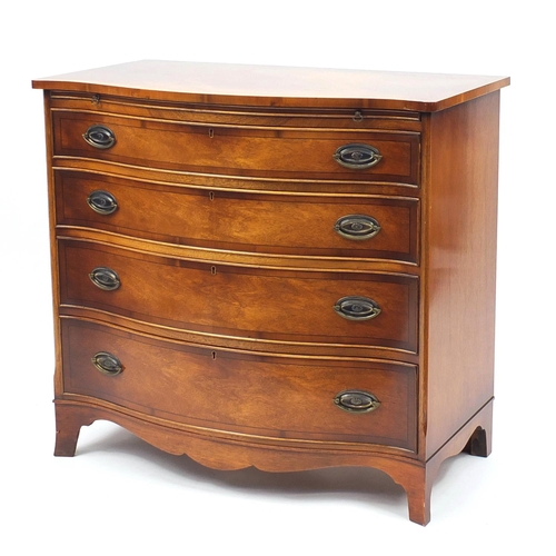 2005 - Good quality reproduction mahogany serpentine chest with yew wood banding and brushing slide above f... 
