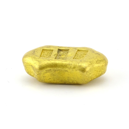2500 - Chinese gilt metal scroll weight, 5.7cm in wide, approximate weight 167.7g