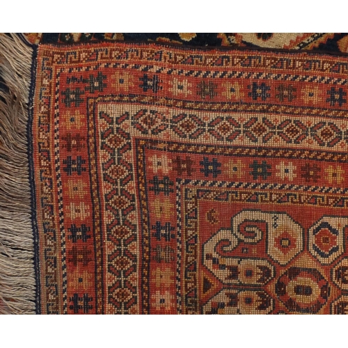 2014 - Rectangular Persian Kashgan rug, having and all over stylised design, 214cm x 138cm
