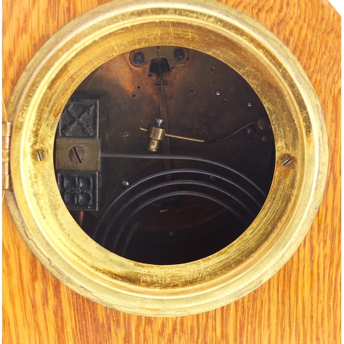 2347 - Edwardian oak mantel clock the painted chapter ring with Roman numerals, 31.5cm high