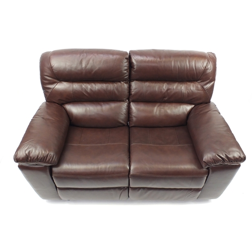 2011 - Brown leather electric reclining two seater 
settee, 155cm wide