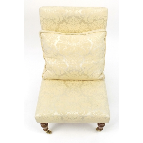 2077 - Mahogany framed nursing chair with cream and gold floral upholstery, 90cm high