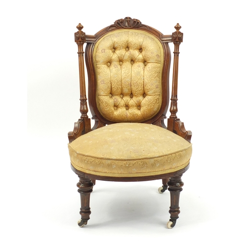 2068 - Victorian walnut nursing chair with gold button back floral upholstery, 78cm high