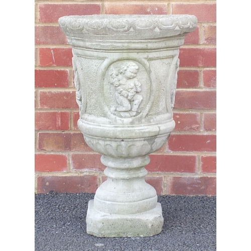 2139 - Stoneware garden planter decorated with putti, 65cm high