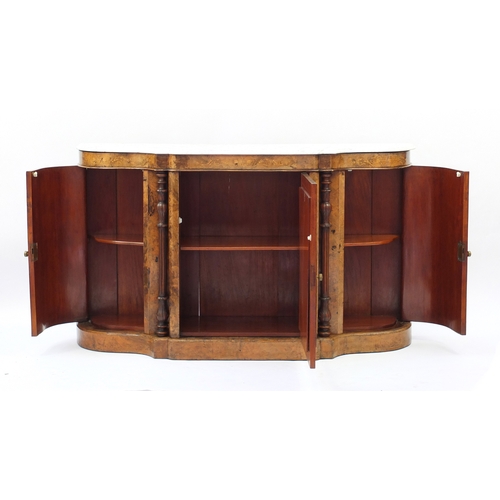 2009 - Victorian inlaid burr walnut Credenza with marble top above a pair of curved cupboard doors flanking... 