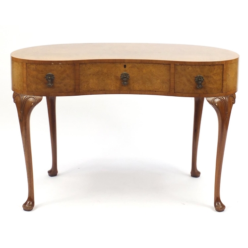 2044 - Waring & Gillow walnut kidney shaped dressing table with three drawers, on carved cabriole legs, 76c... 