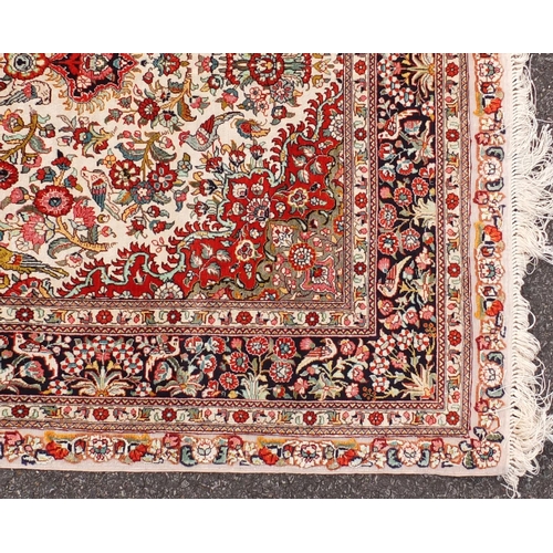 2006 - Fine rectangular silk rug having all over floral motifs, 155cm x 93cm
