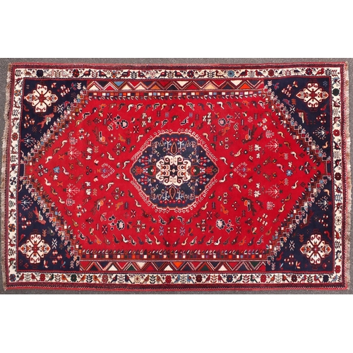 2050 - Persian Shriaz red and blue ground rug, decorated with birds and geometric design, 310cm x205cm