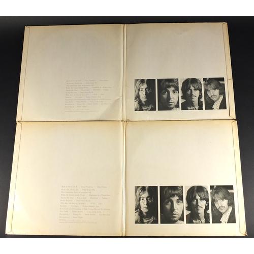 2597 - Two Beatles mono White Album vinyl LP's with photographs and posters, numbers 137904 and 28718