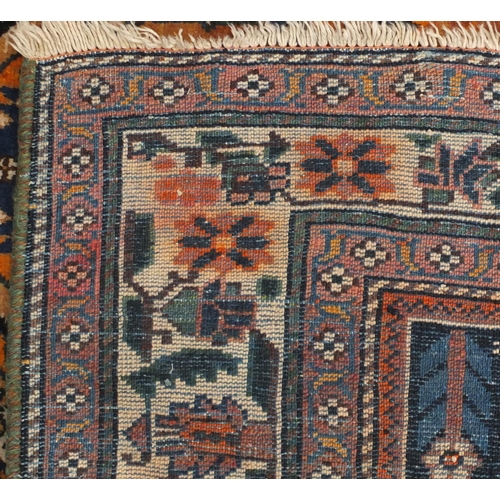 2132 - Rectangular North West Persian Yalameg rug, the central field having a flower and bird design onto a... 