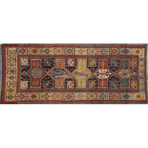 2133 - 19th century rectangular Caucasian carpet runner, 263cm x 105cm