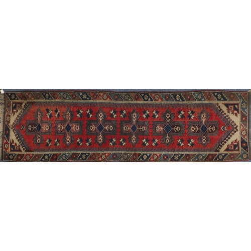2134 - Rectangular Turkish Anatolian carpet runner, the central field having a repeat flower design onto a ... 