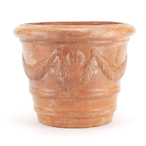2143 - Roman style terracotta vessel decorated in relief with swags, 24cm high