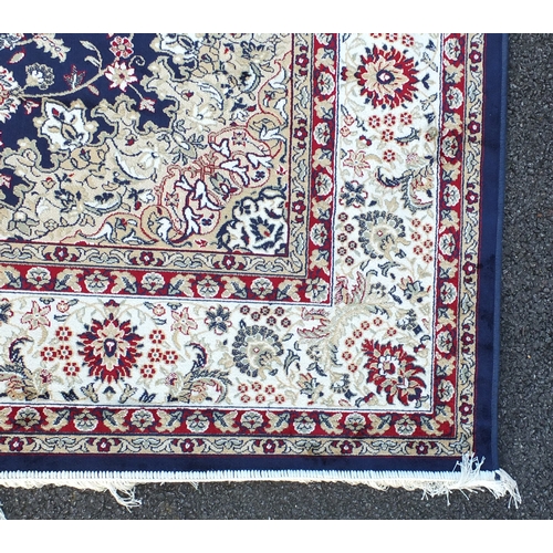 2096 - Rectangular Keshan design blue ground floral carpet, 300cm x 200cm