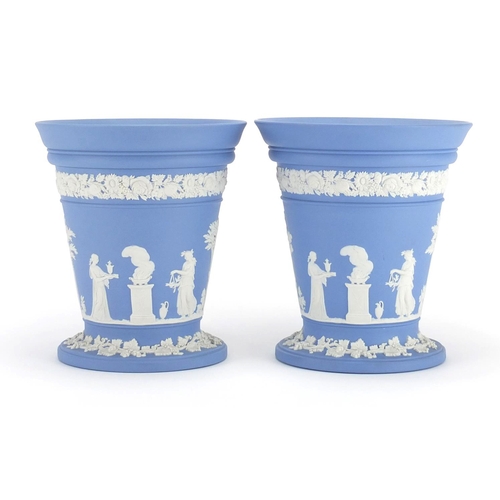 2255 - Pair of Wedgwood Jasper Ware vases, each decorated with maidens in a landscape, each 17cm high