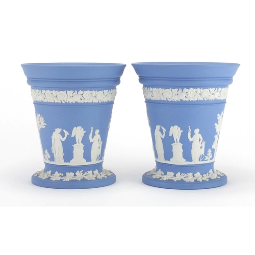 2255 - Pair of Wedgwood Jasper Ware vases, each decorated with maidens in a landscape, each 17cm high