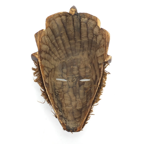 806 - African carved wood wall mask with wire inlay, 42cm in length