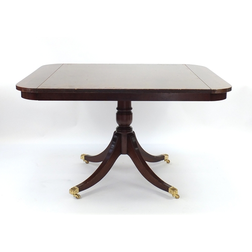 119 - Reproduction inlaid mahogany extending dining table with six chairs including two carvers, can be us... 
