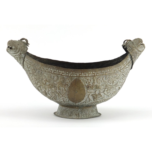 799 - Middle Eastern brass centre piece with mythical animal head handles, 46cm wide