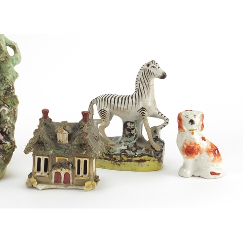 317 - Staffordshire figure group cottages and animals including a Zebra