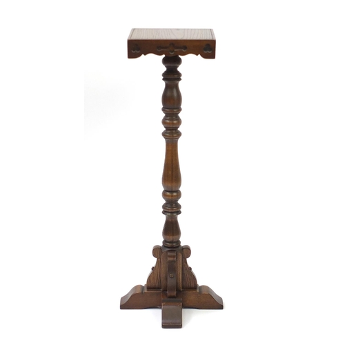 177 - Carved oak torchiere, 94cm high