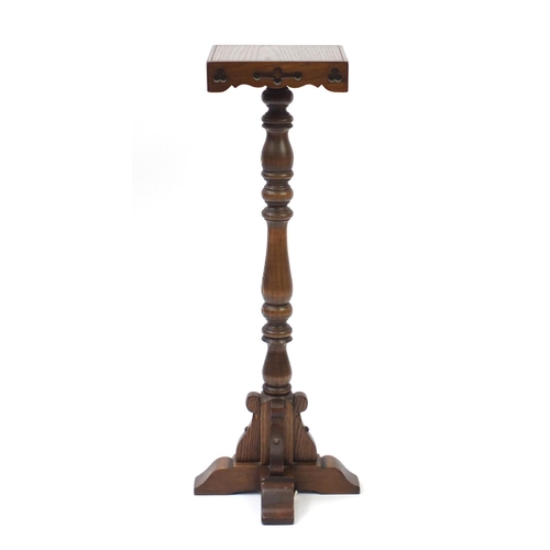 177 - Carved oak torchiere, 94cm high