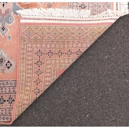 8 - Pink and blue ground rug with geometric design, 270cm x 180cm