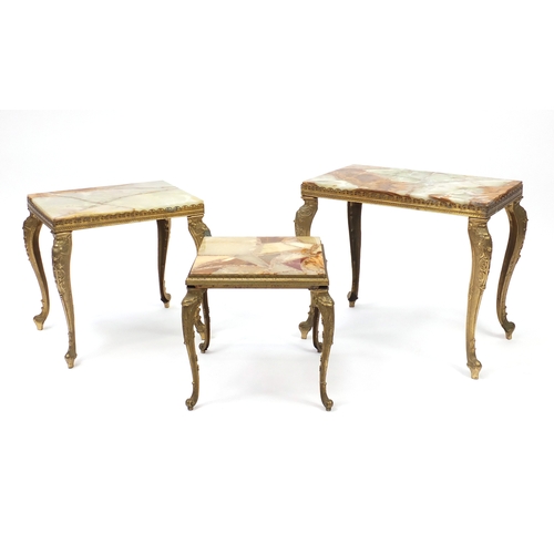 87 - Nest of three onyx and brass tables, the largest 45cm H x 51cm W 30cm D