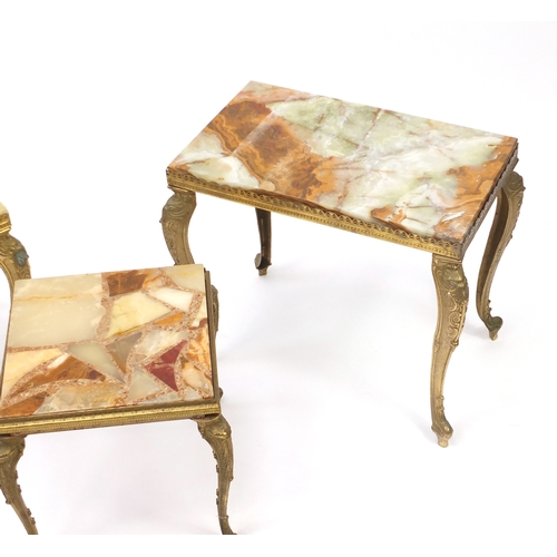 87 - Nest of three onyx and brass tables, the largest 45cm H x 51cm W 30cm D