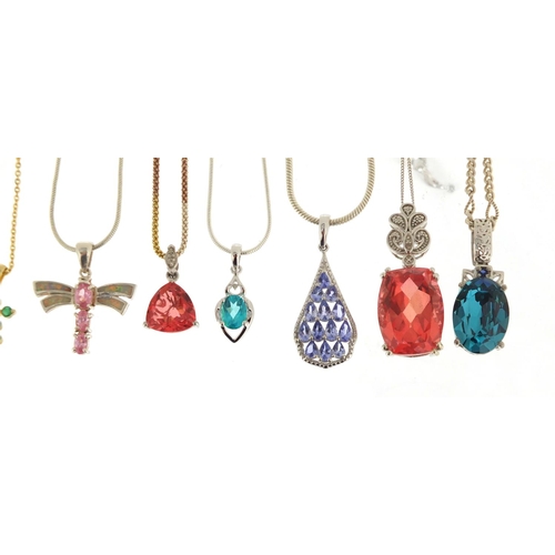 386 - Ten silver semi precious stone pendants on silver necklaces, approximate weight 75.2g