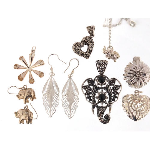 398 - Silver jewellery comprising four pairs of earrings and six pendants, approximate weight 58.2g