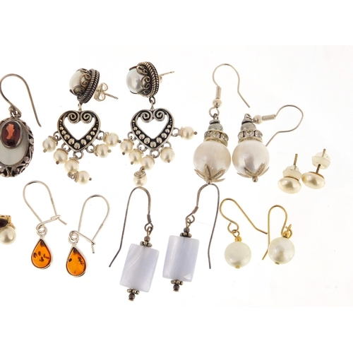 412 - Ten pairs of silver and white metal semi precious stone earrings, approximate weight 41.4g