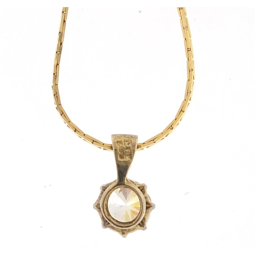 394 - 9ct gold necklace with a silver gilt clear stone pendant, approximate weight of the necklace 2.3g