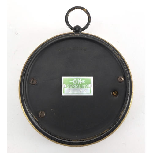 965 - Circular brass framed aneroid barometer, serial number 0357, 13.5cm in diameter