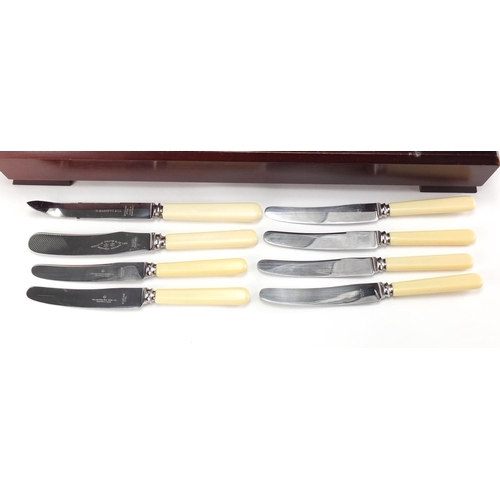 481 - Silver plated and stainless steel cutlery housed in a mahogany canteen