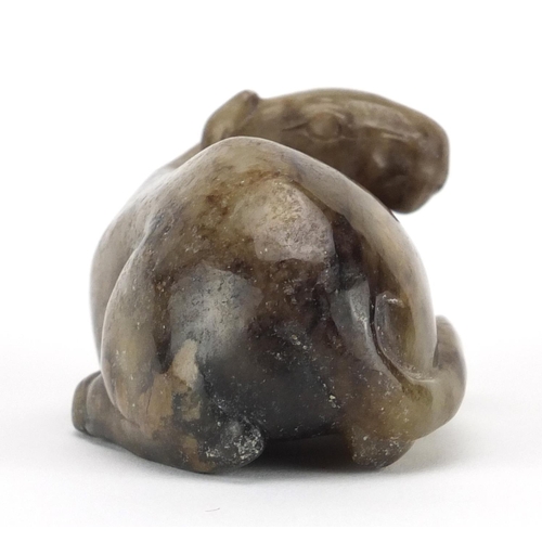 671 - Chinese russet and white jade carving of a foal, 8.5cm wide