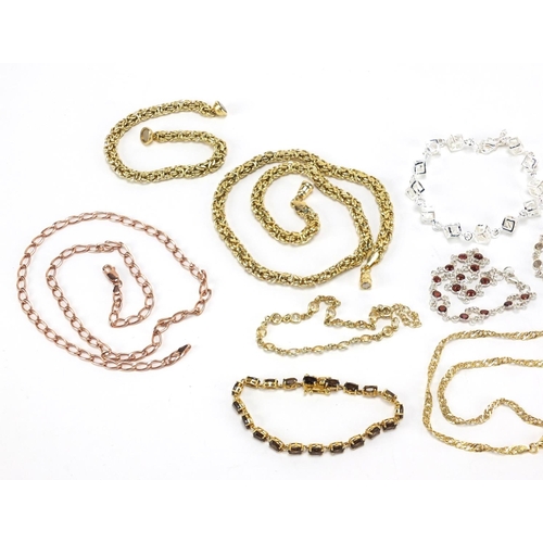 383 - Ten silver necklaces and bracelets, some set with semi precious stones, approximate weight 96.3g