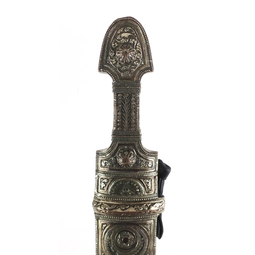 968 - Caucasian Kindjal dagger with silver coloured metal handle and scabbard, each having foliate motifs ... 