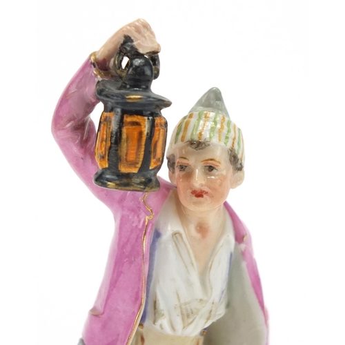 335 - 19th century German figure of a man holding a lantern by Plaue, 12.5cm high