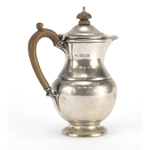 533A - Silver bachelor's water pot with wooden handle and knop, by Mappin & Webb London 1927, 15.5cm high, ... 