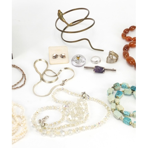 635 - Costume jewellery including silver necklaces and earrings, amber coloured bead necklace, freshwater ... 